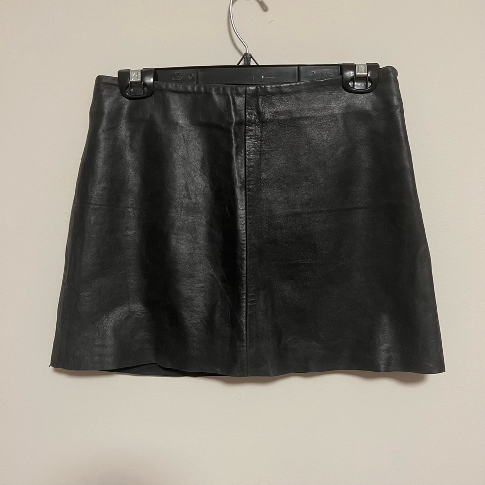 Black leather mini skirt